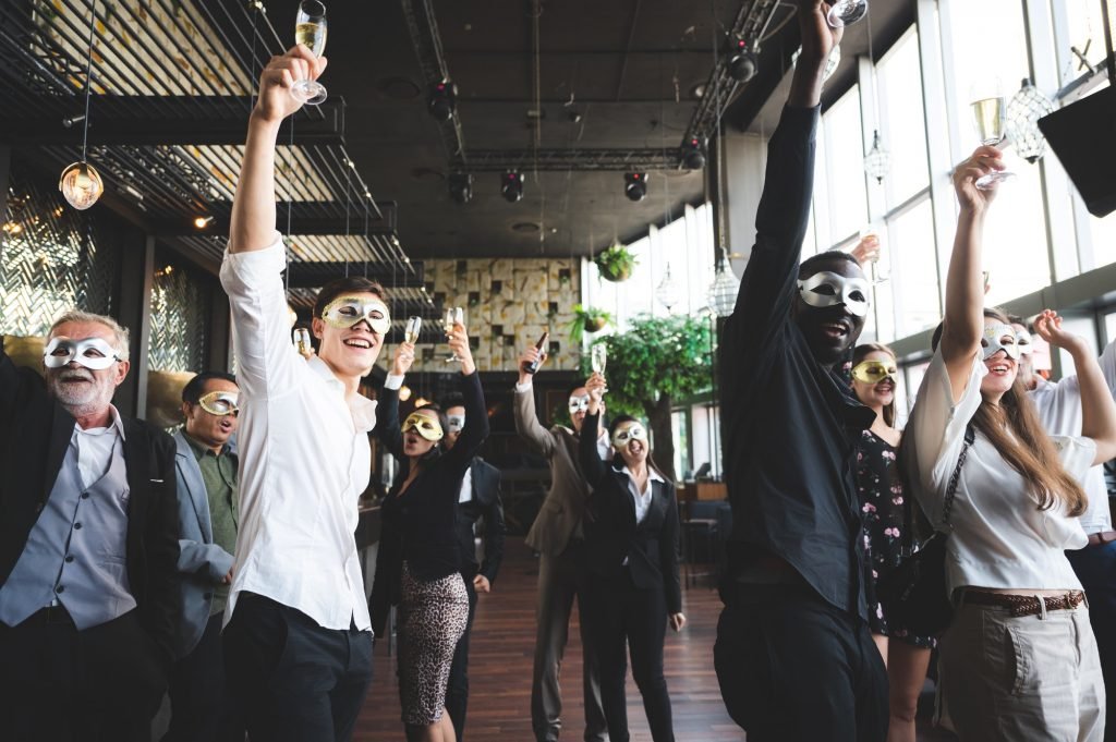 A celebration of business success and performance Business groups relax with wine